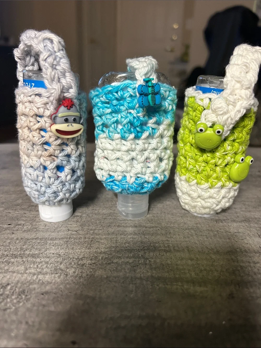 Crochet Hand Sanitizer with button accents. Set of 3